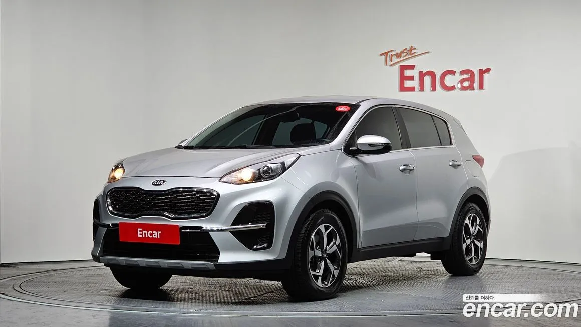 Kia Sportage — фото 1