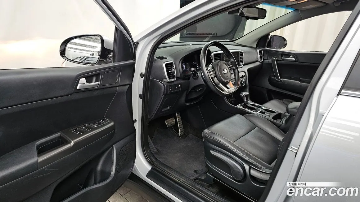 Kia Sportage — фото 6