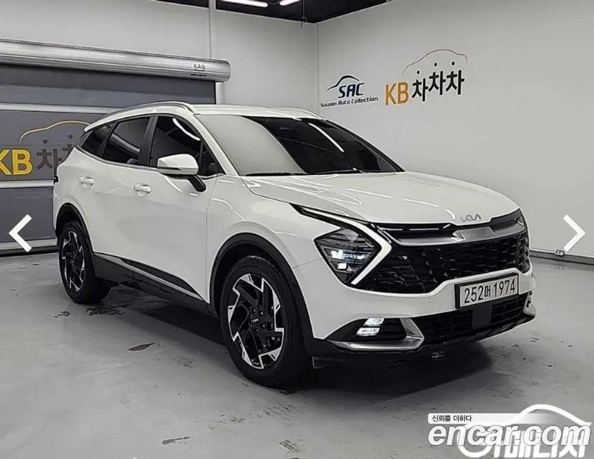 Kia Sportage — фото 1