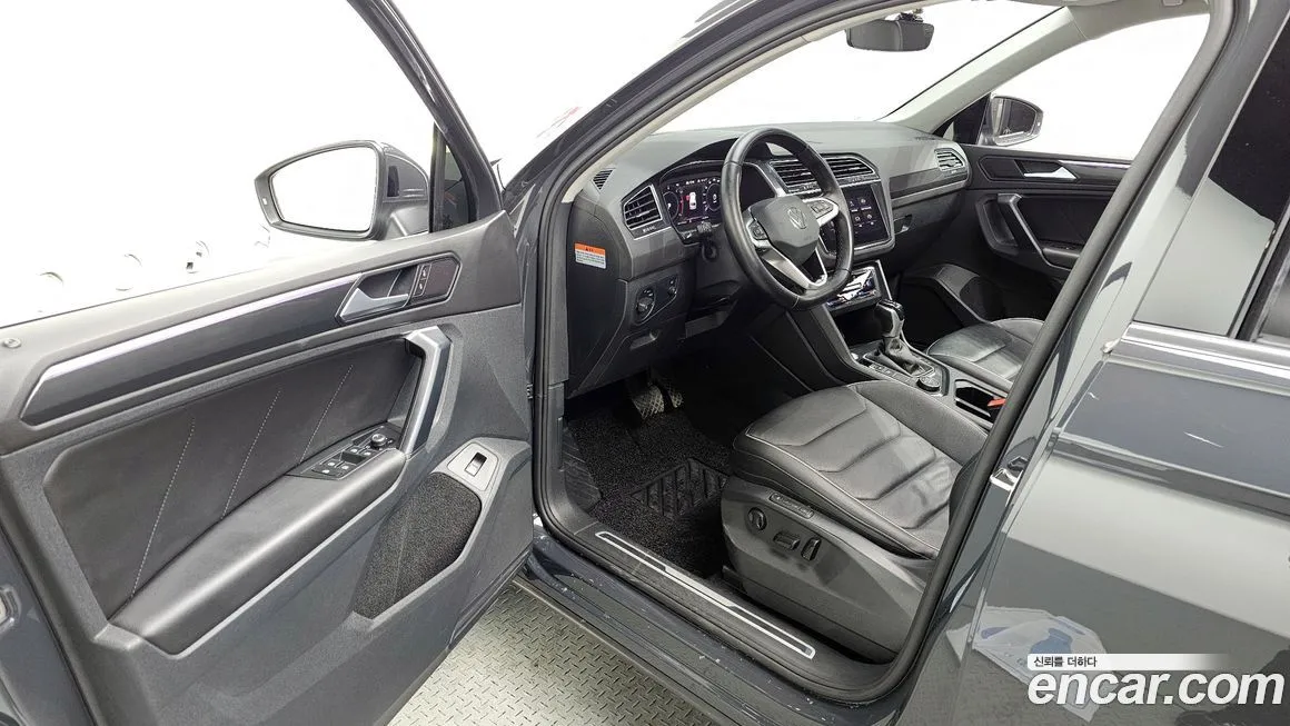 Volkswagen Tiguan — фото 10