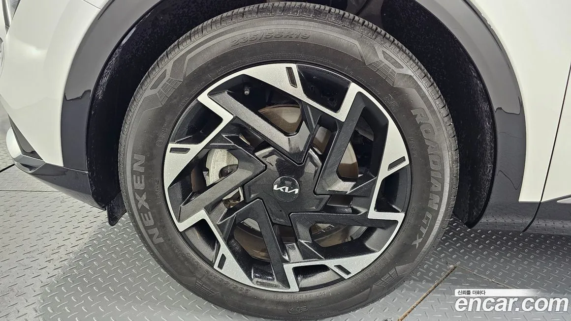 Kia Sportage — фото 8