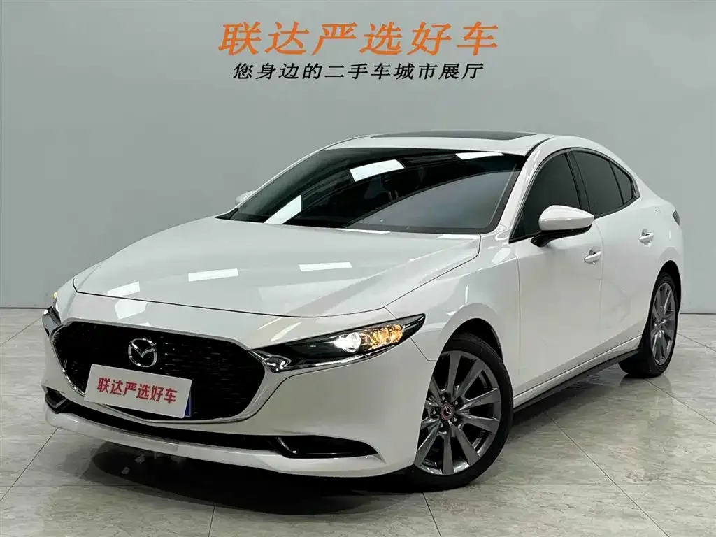 Mazda 3 Axela — фото 1