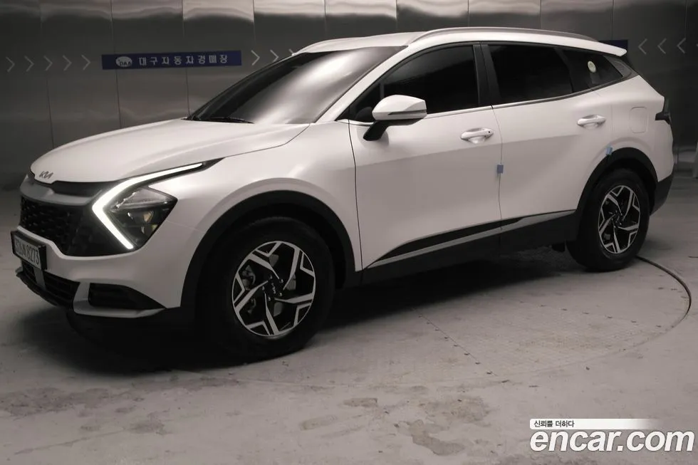 Kia Sportage — фото 1
