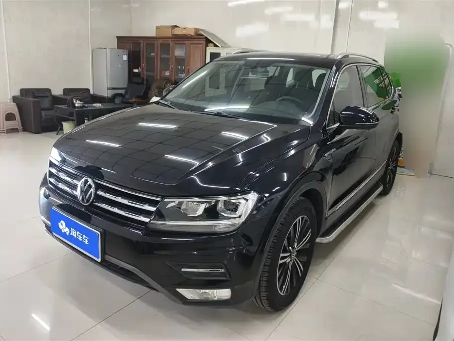 Volkswagen Tiguan L — фото 1