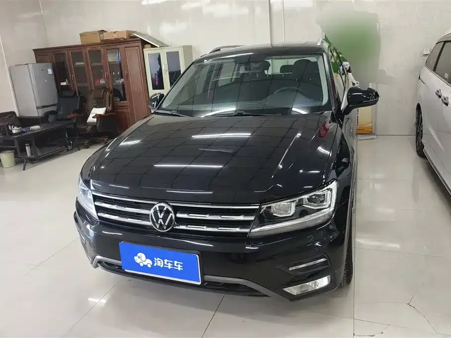Volkswagen Tiguan L — фото 10