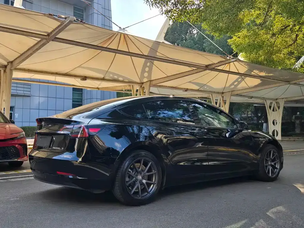 Tesla Model 3 — фото 6
