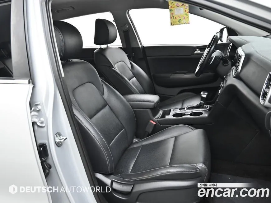 Kia Sportage — фото 10
