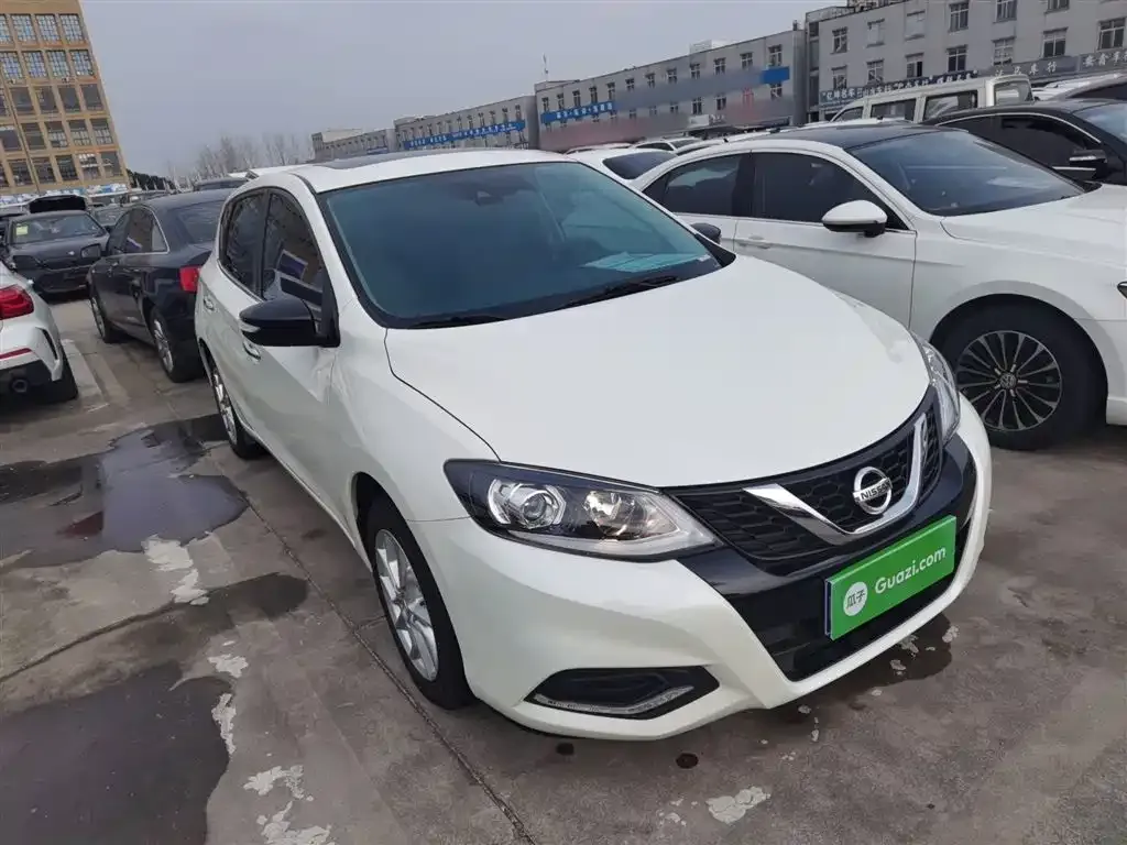 Nissan Tiida — фото 10