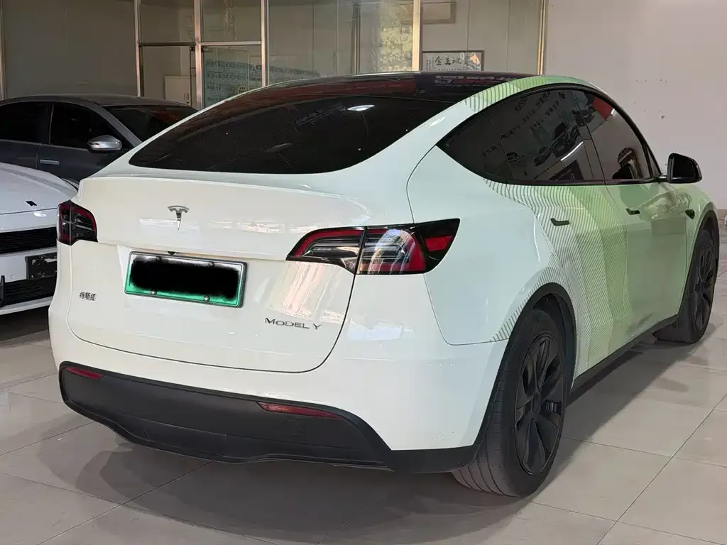 Tesla Model Y — фото 7