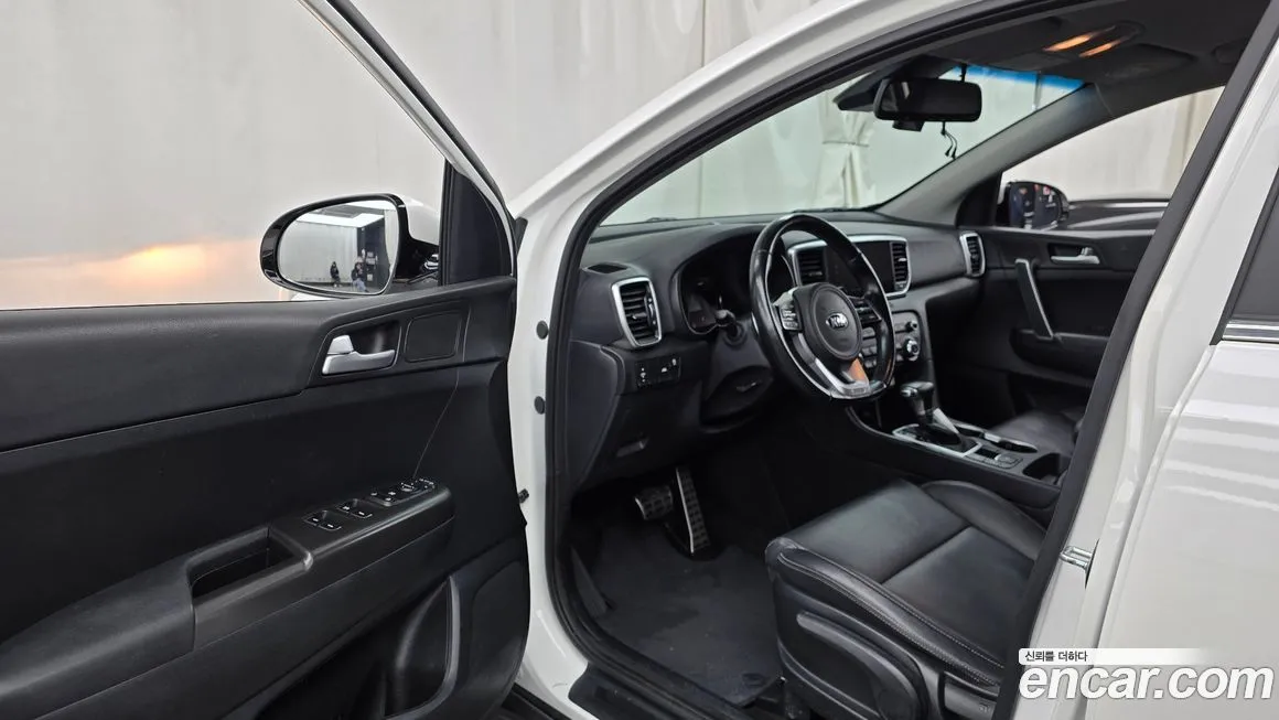Kia Sportage — фото 7