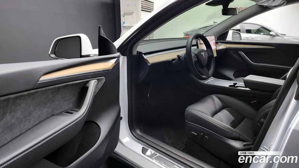 Tesla Model Y — фото 7