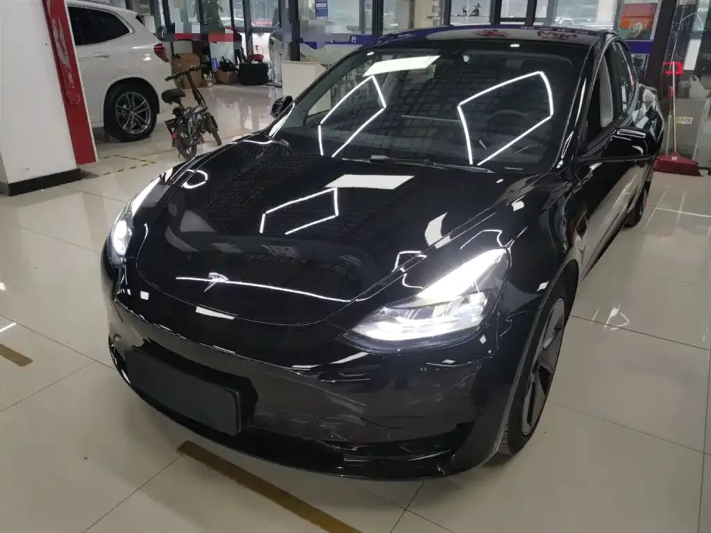 Tesla Model 3 — фото 9