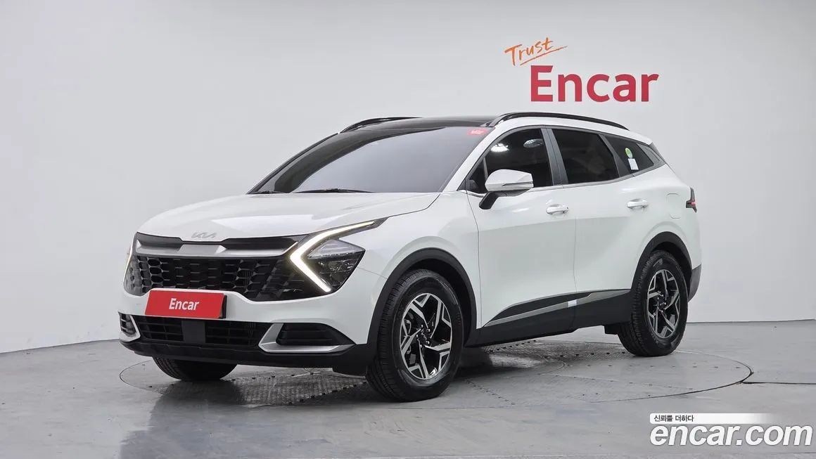 Kia Sportage — фото 1