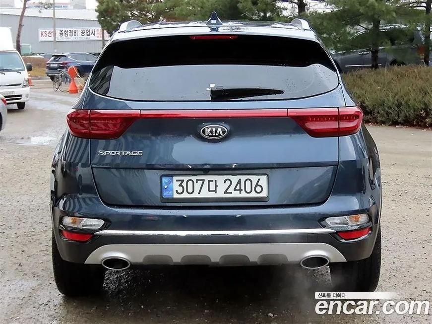 Kia Sportage — фото 7