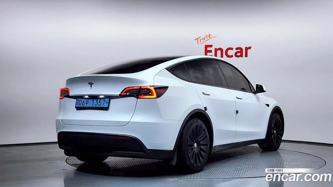 Tesla Model Y — фото 6