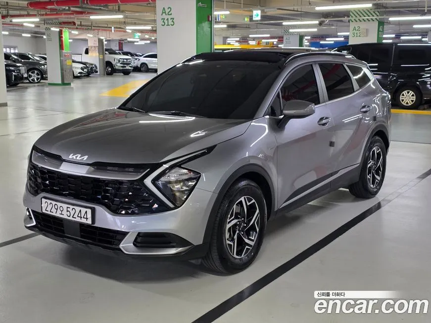 Kia Sportage — фото 1