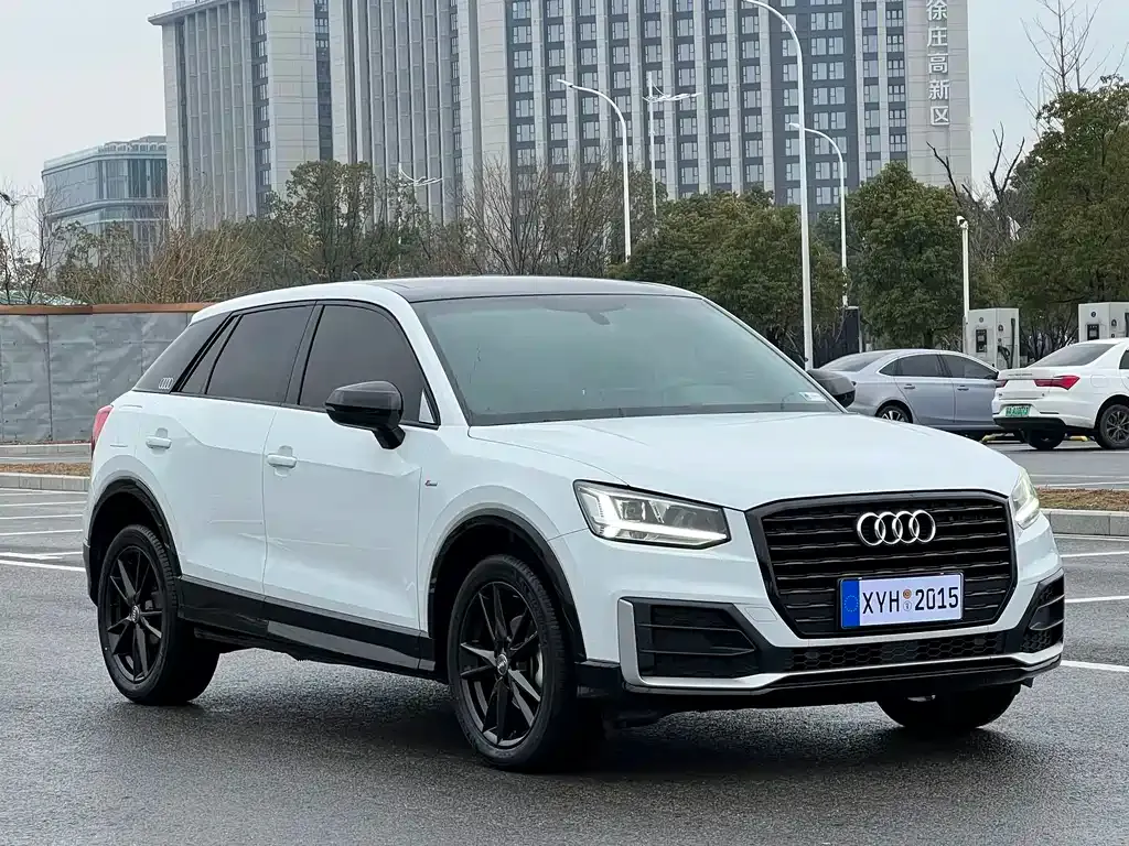 Audi Q2L — фото 10