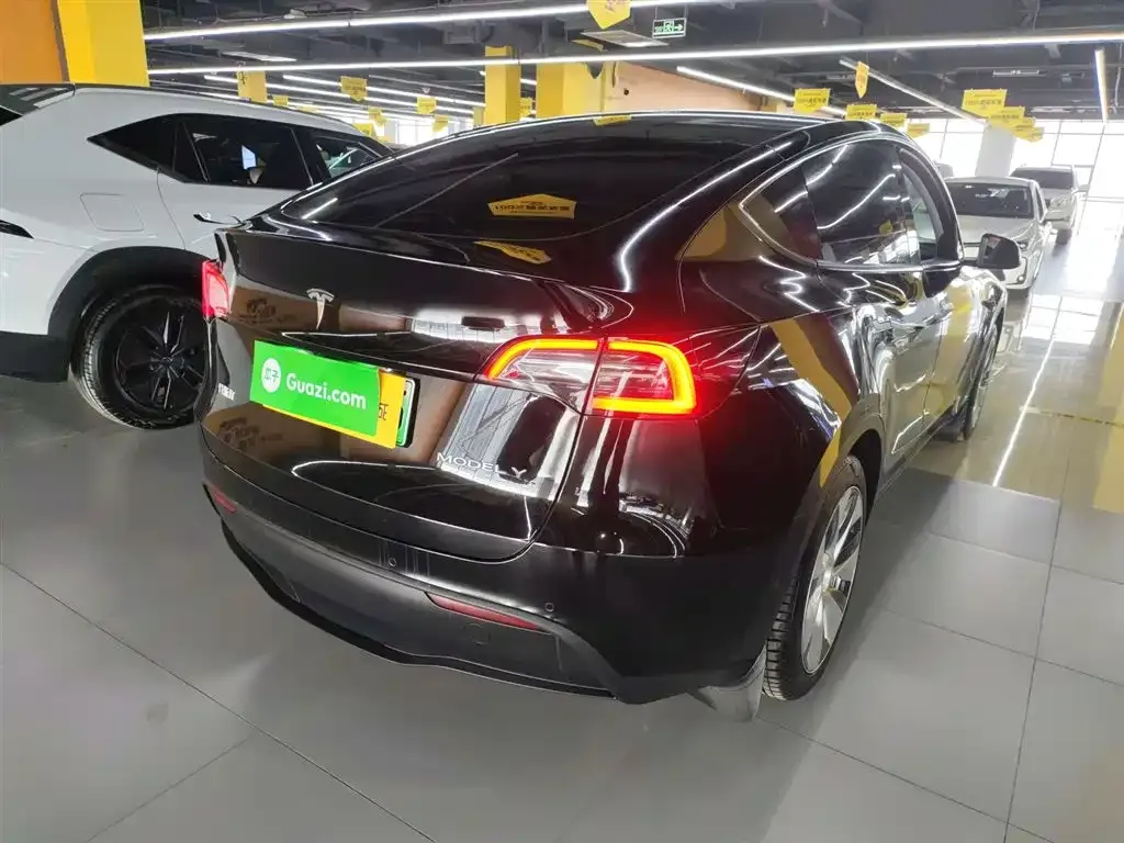 Tesla Model Y — фото 7