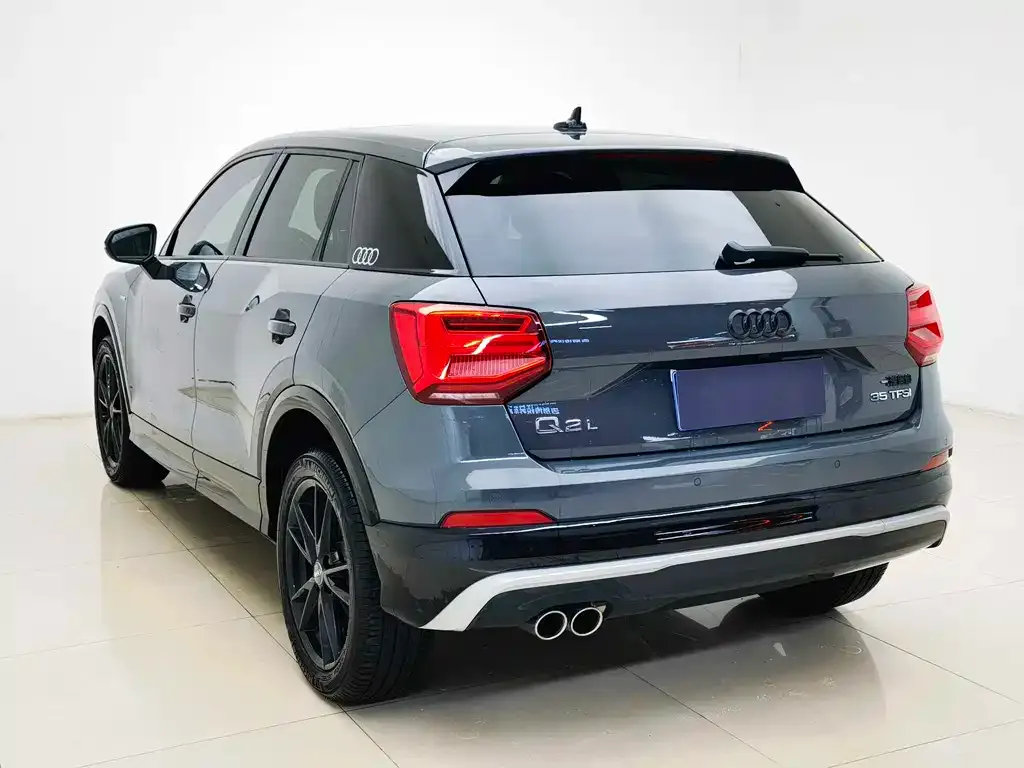 Audi Q2L — фото 6