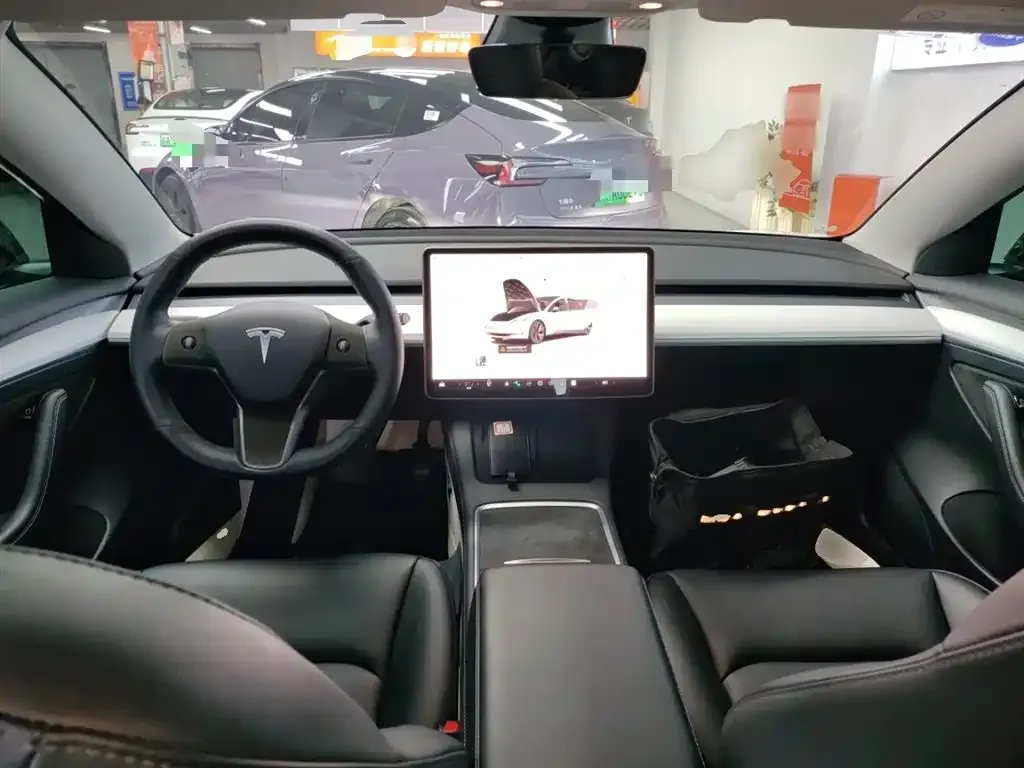 Tesla Model 3 — фото 4