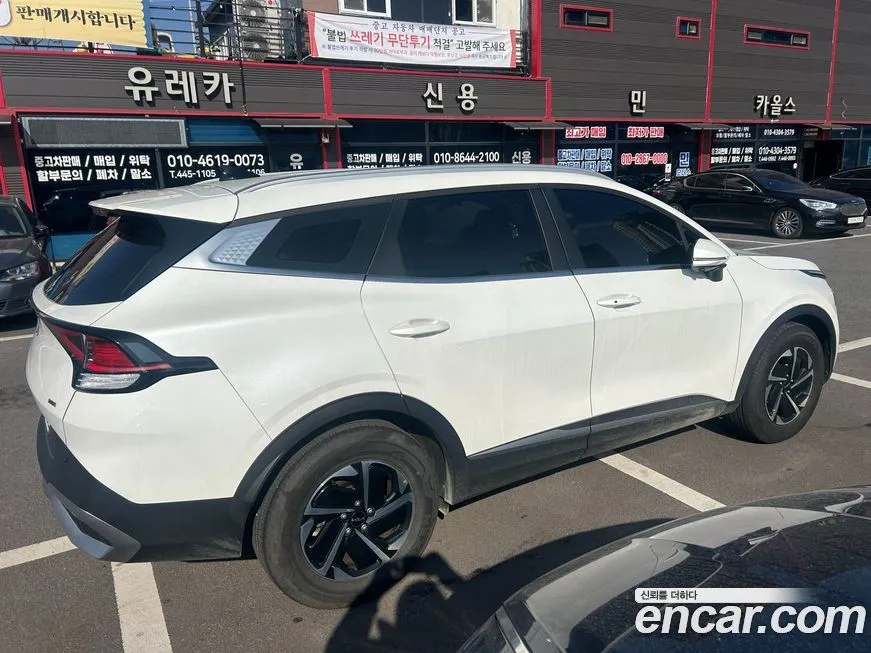 Kia Sportage — фото 10