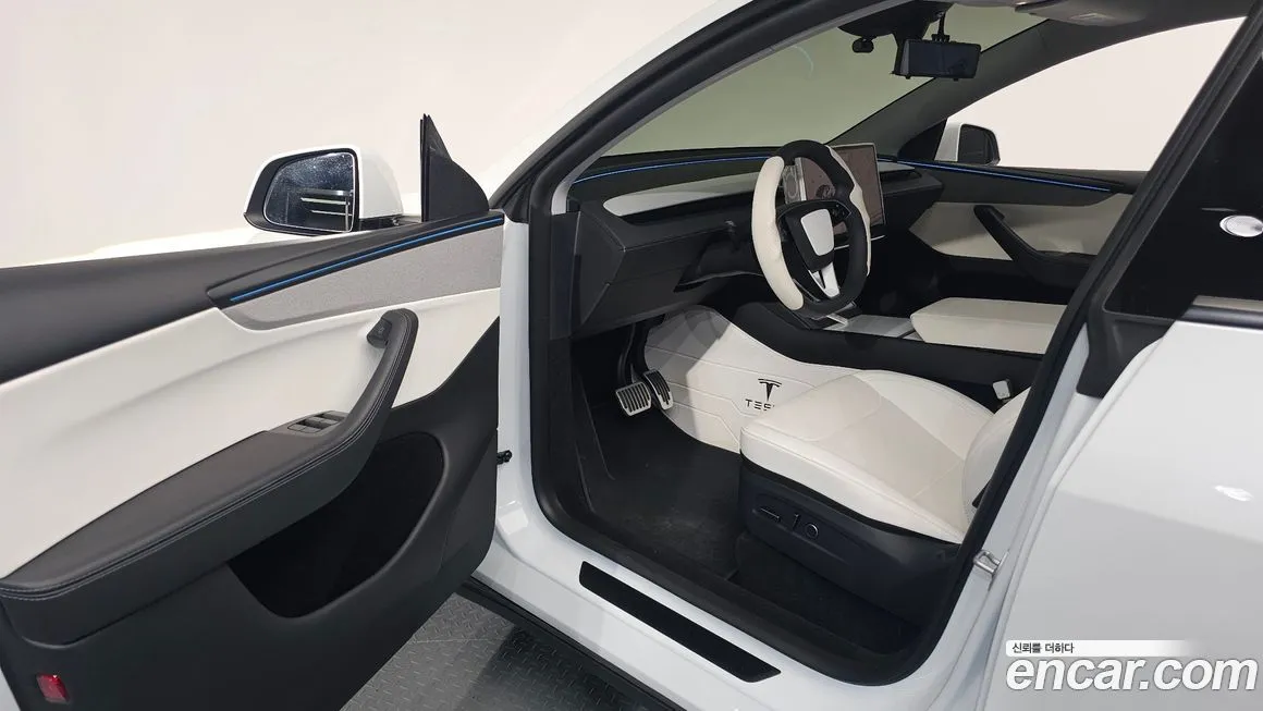 Tesla Model Y — фото 9
