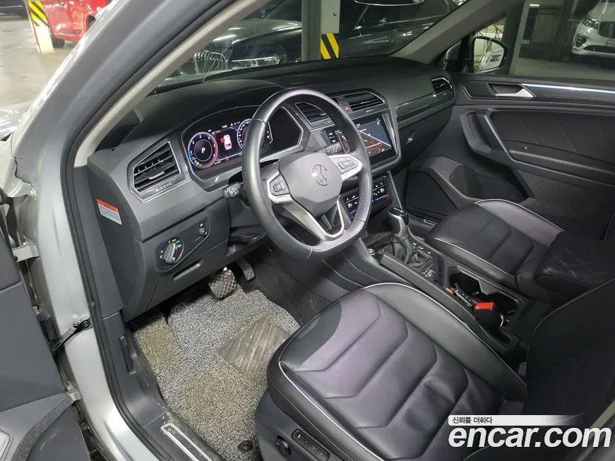 Volkswagen Tiguan — фото 10