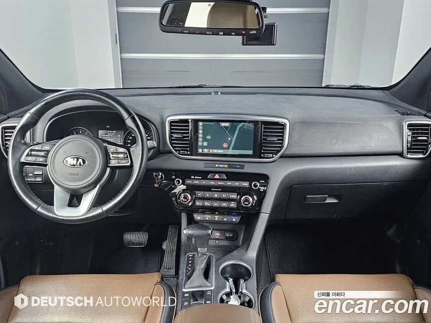 Kia Sportage — фото 7
