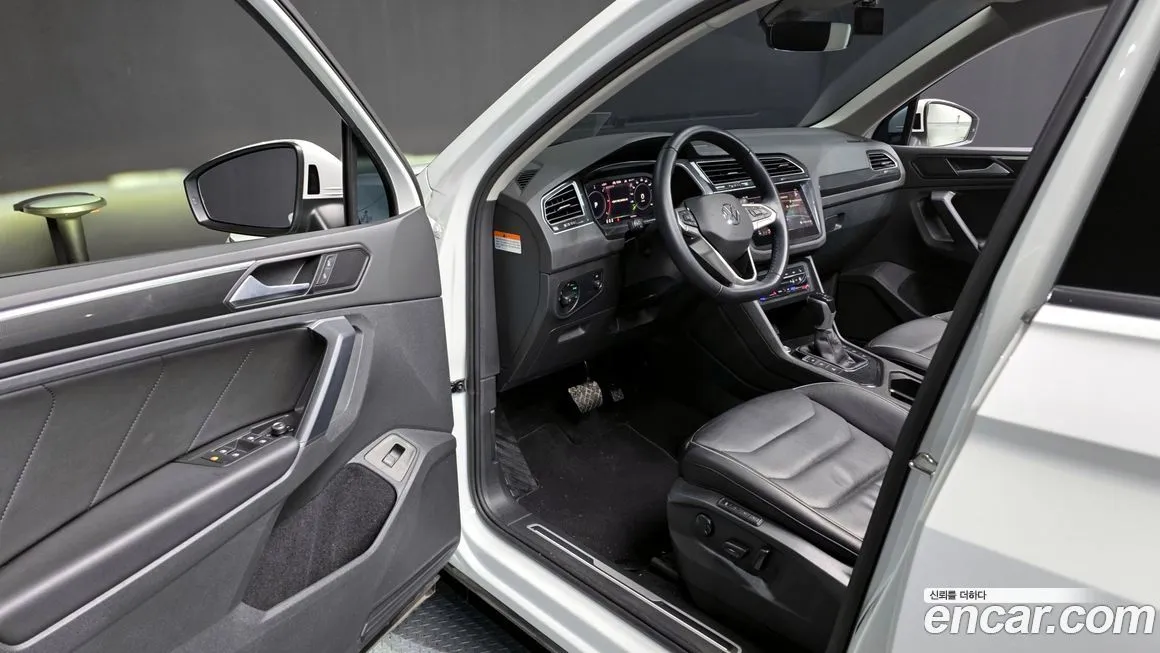 Volkswagen Tiguan — фото 10