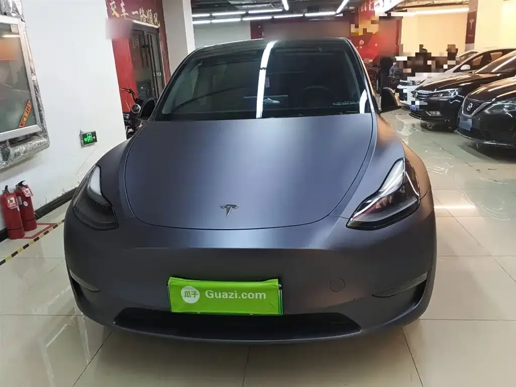 Tesla Model Y — фото 10