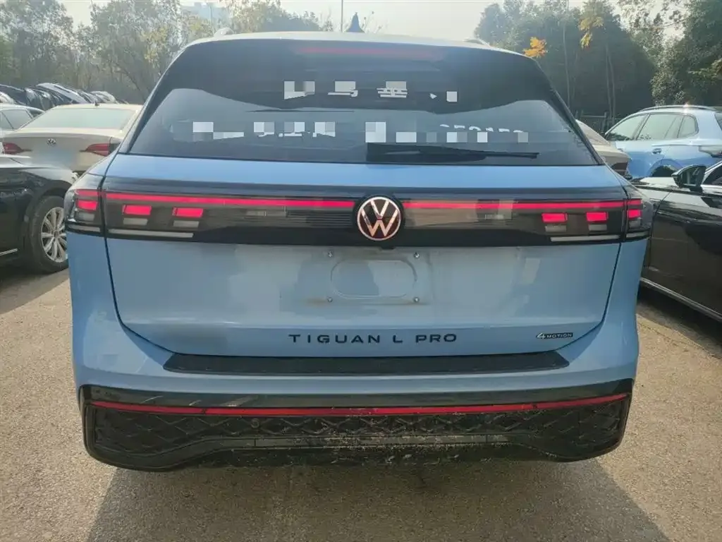 Volkswagen Tiguan L — фото 2