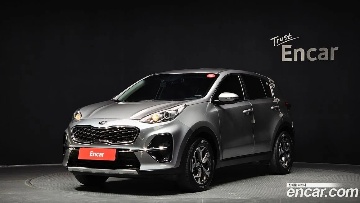 Kia Sportage — фото 1