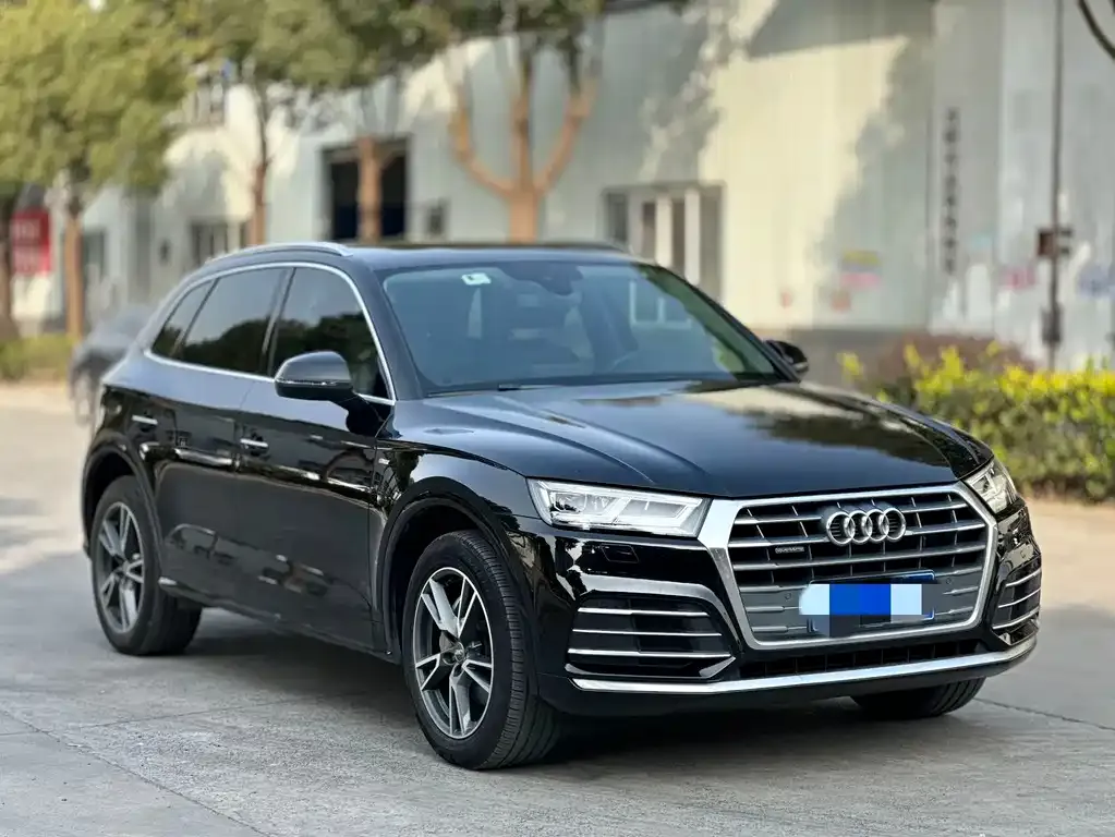Audi Q5L — фото 5