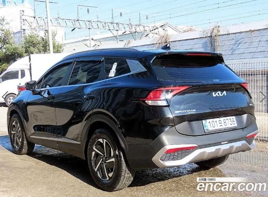 Kia Sportage — фото 9