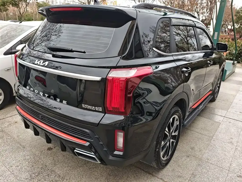 Kia Sportage — фото 7