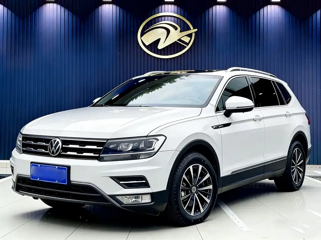 Volkswagen Tiguan L — фото 1