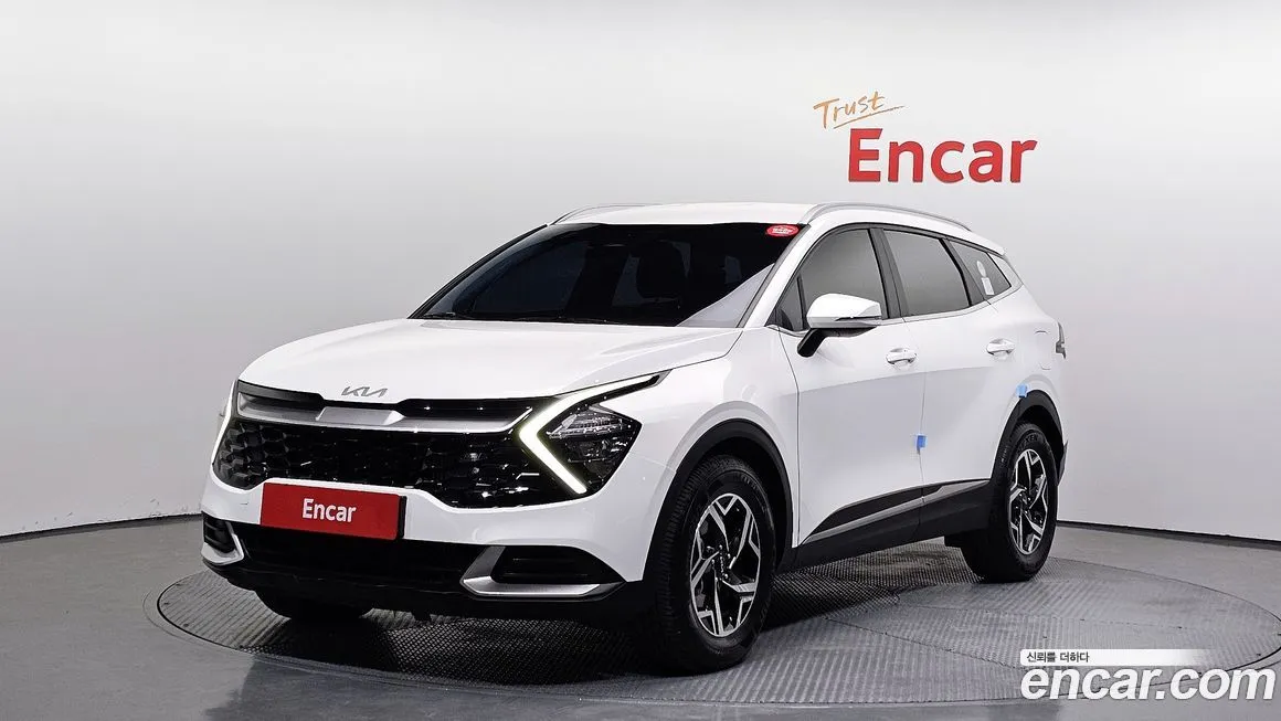 Kia Sportage — фото 1