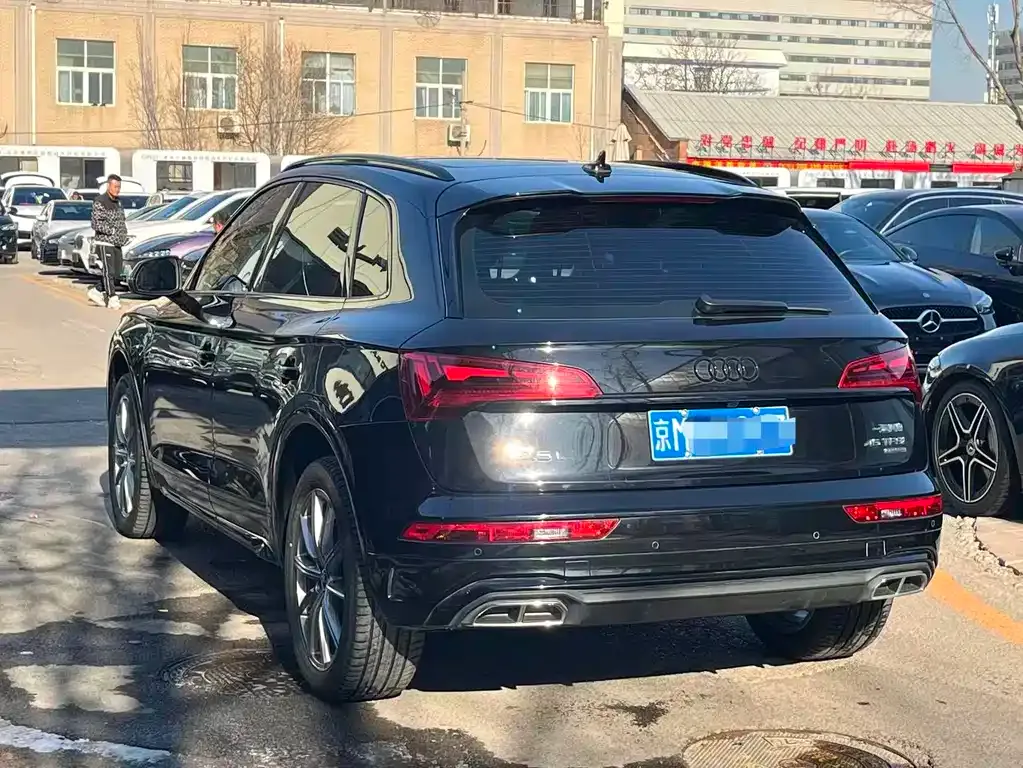 Audi Q5L — фото 10