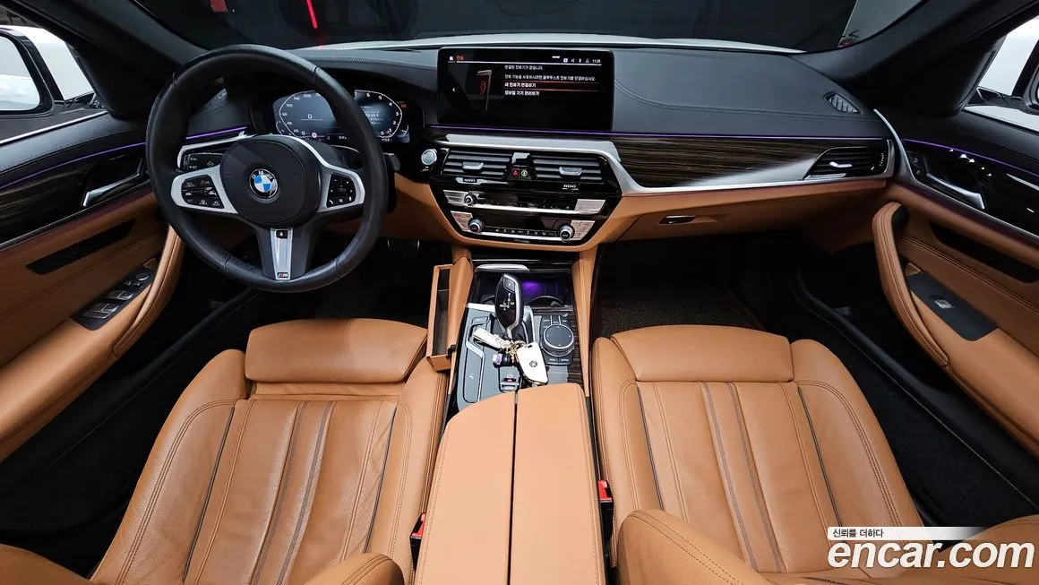 BMW 5-Series — фото 10