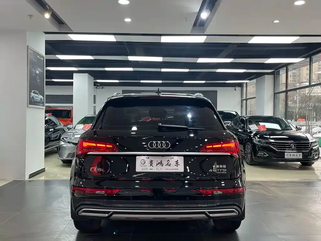 Audi Q5L — фото 5