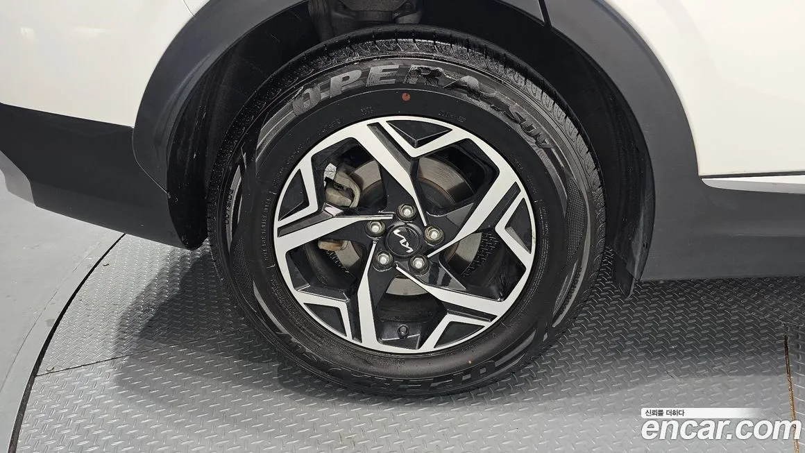 Kia Sportage — фото 10