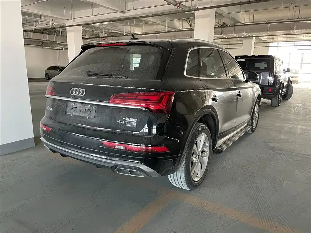 Audi Q5L — фото 9