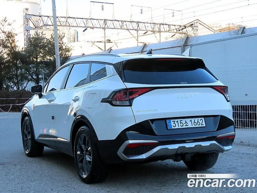 Kia Sportage — фото 1