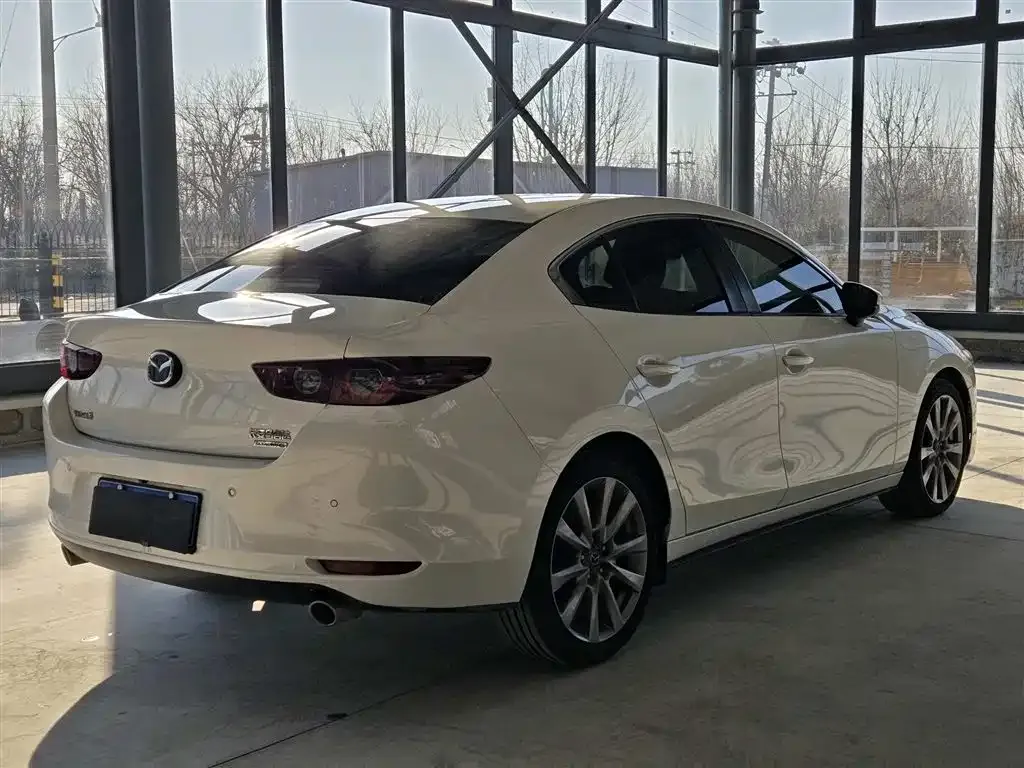 Mazda 3 Axela — фото 4