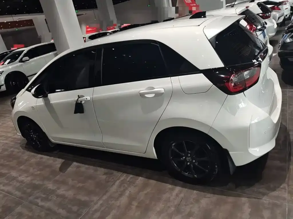 Honda Fit — фото 9
