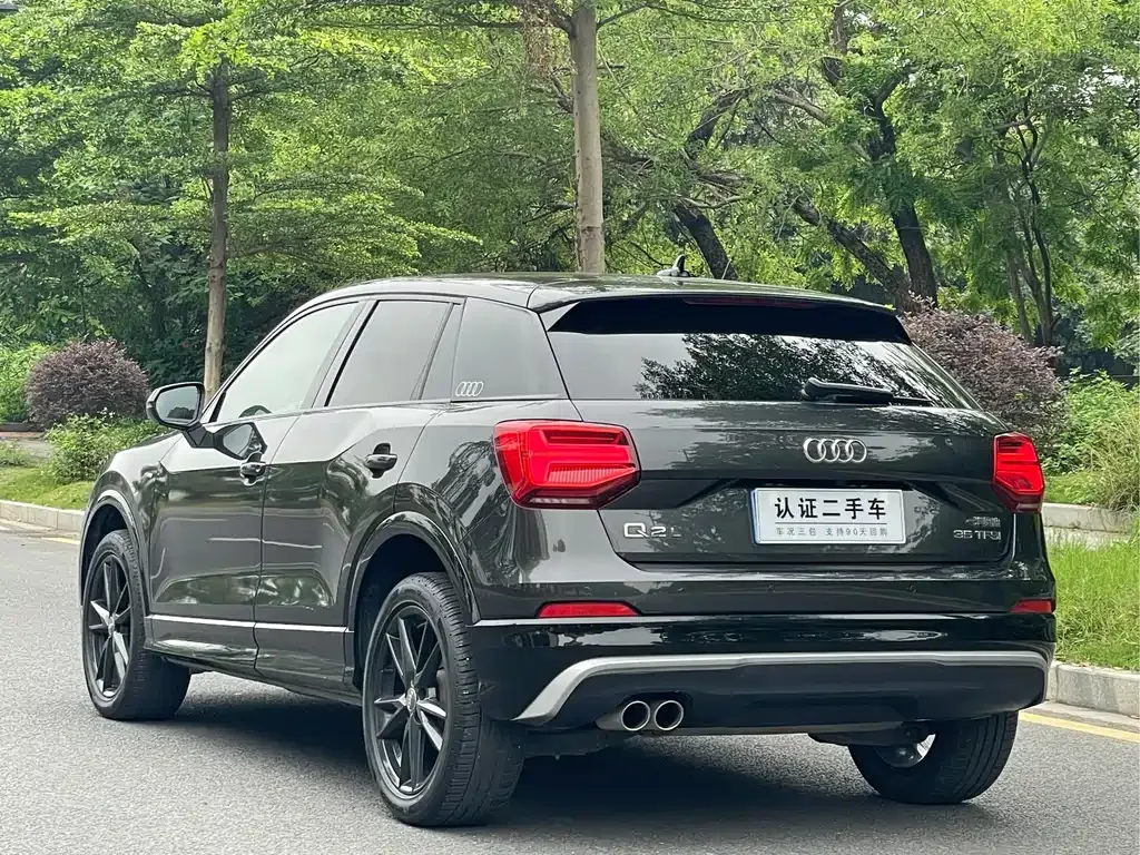 Audi Q2L — фото 7