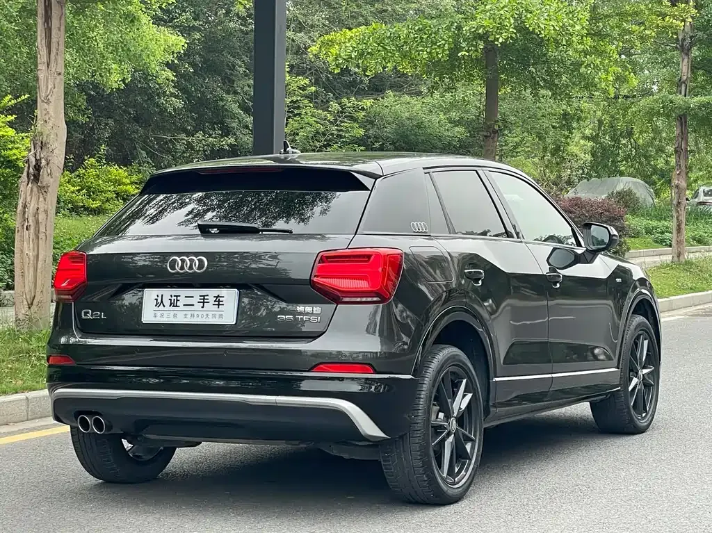 Audi Q2L — фото 9