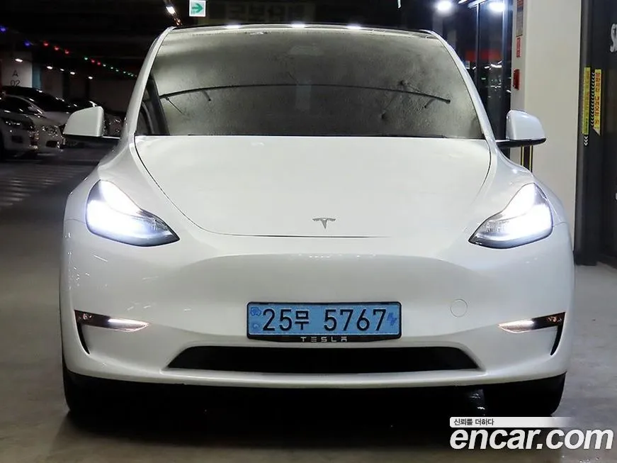 Tesla Model Y — фото 5