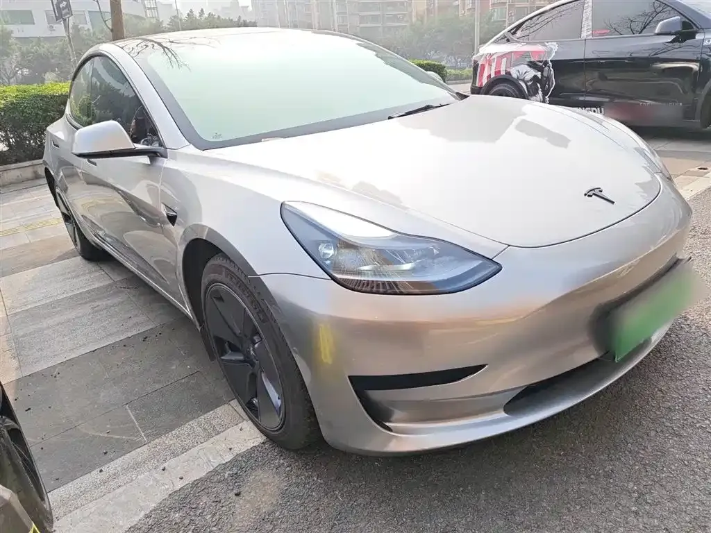 Tesla Model 3 — фото 7