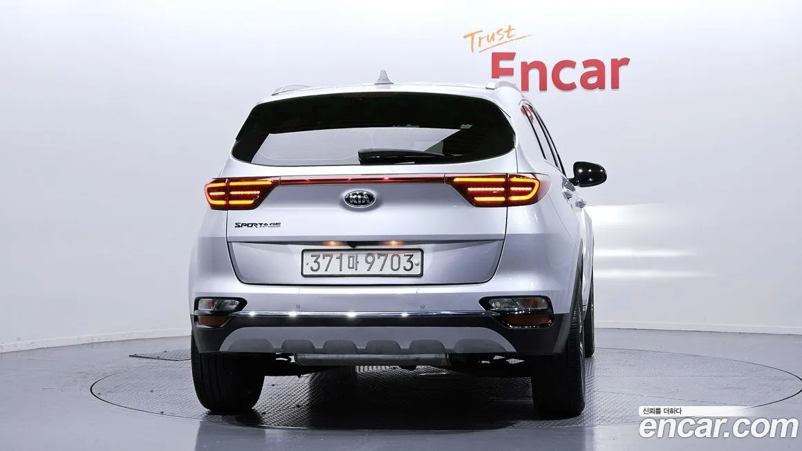 Kia Sportage — фото 7